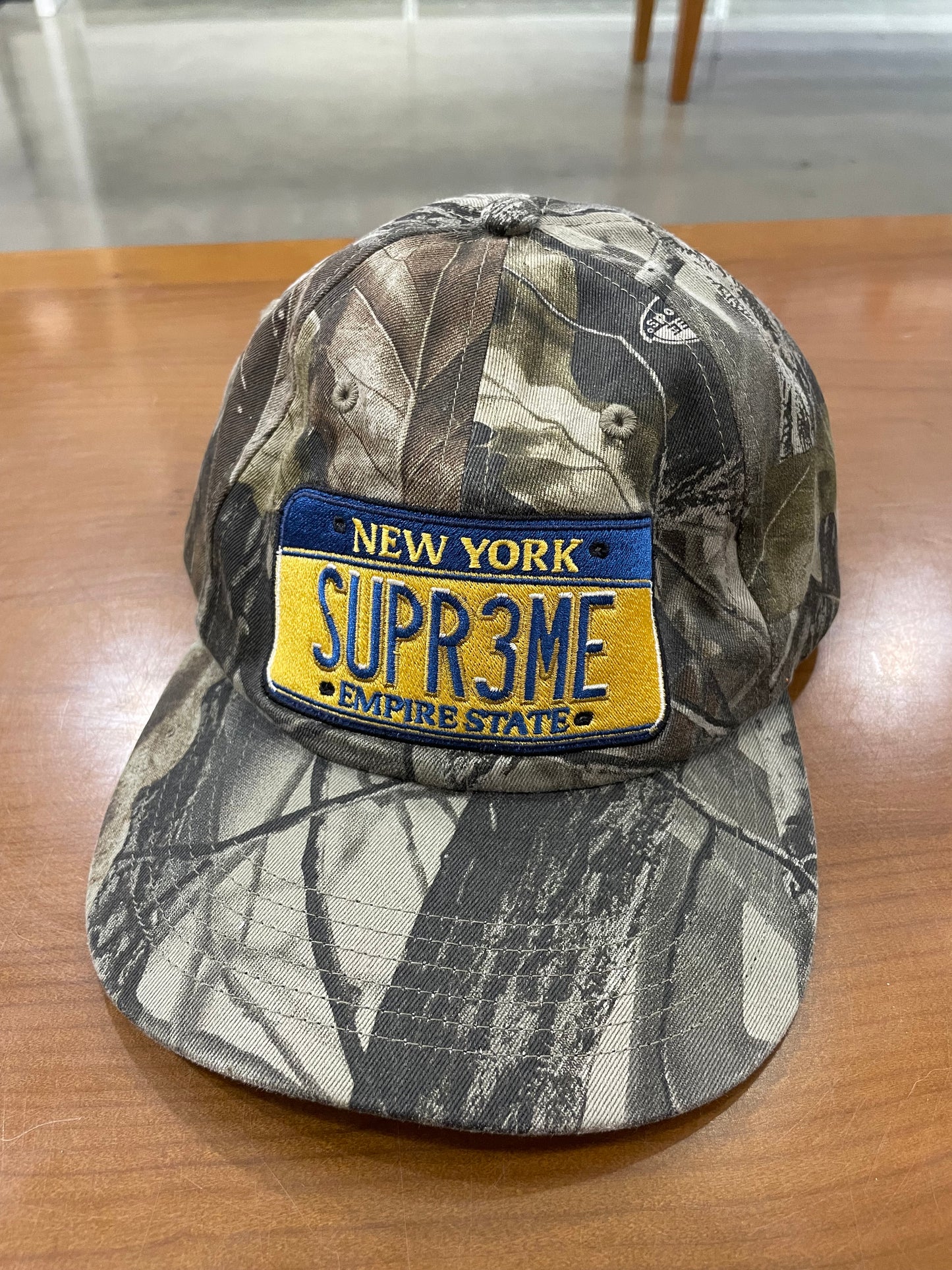 Preowned Supreme License Plate Hat Camo