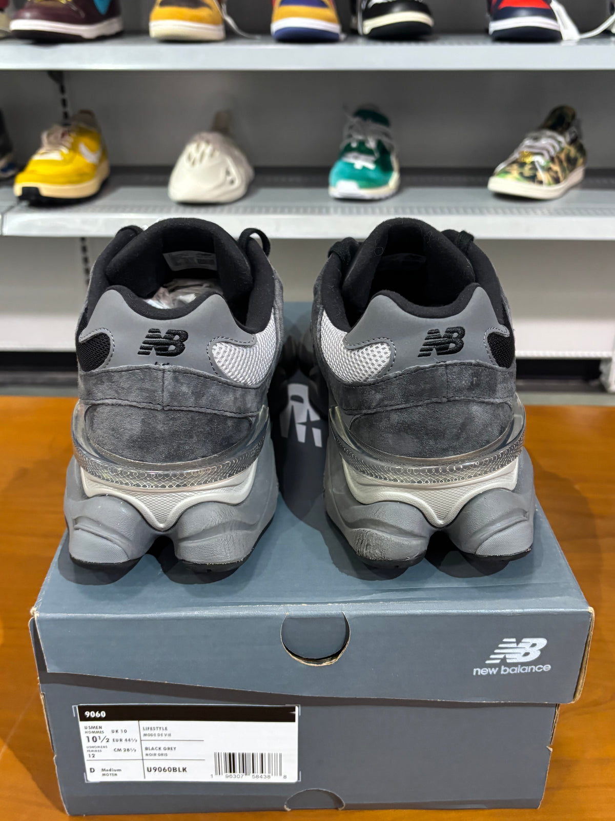 Preowned new balance 9060 Black Castlerock Grey