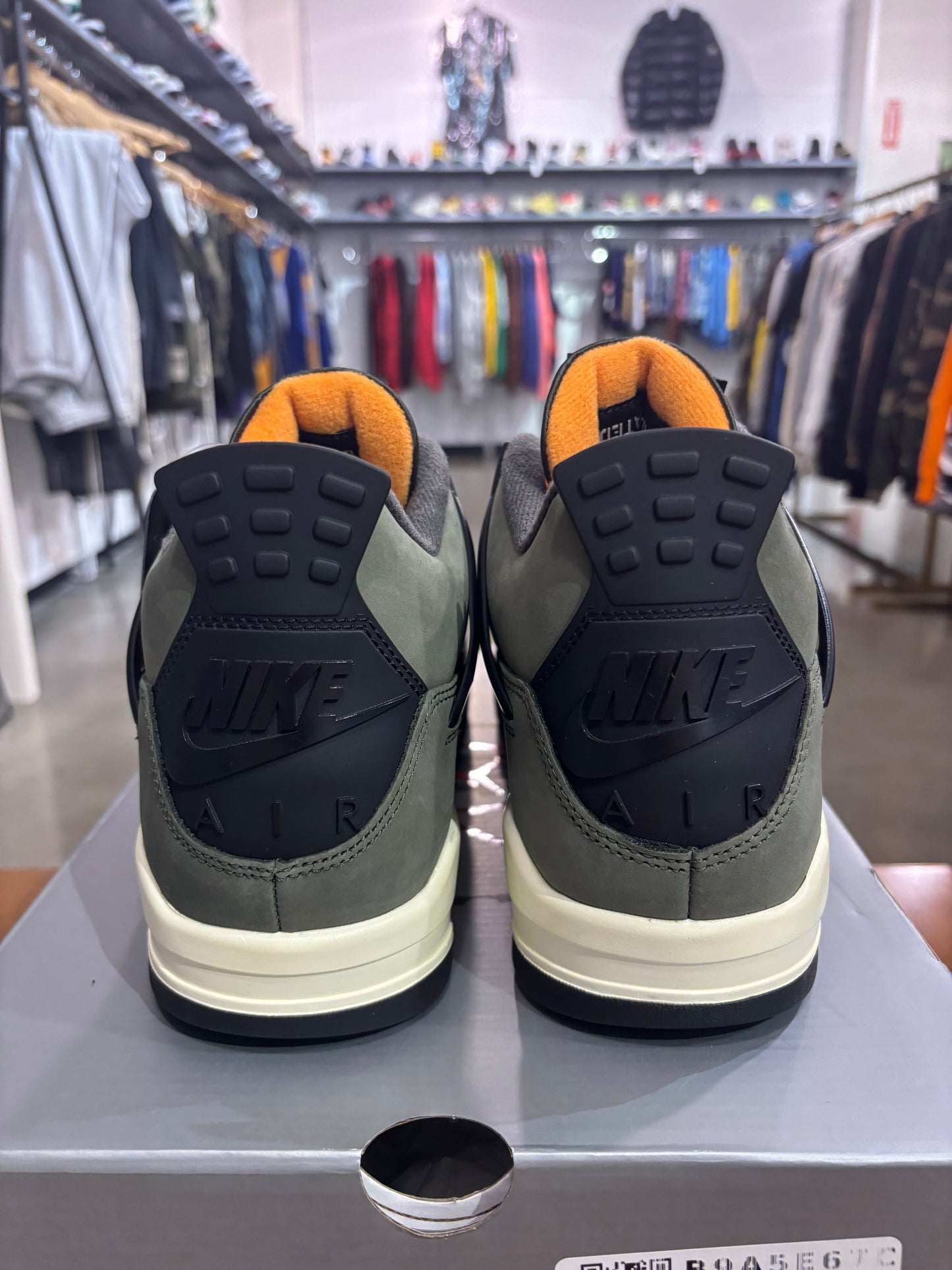 Preowned Air Jordan 4 Undefeated